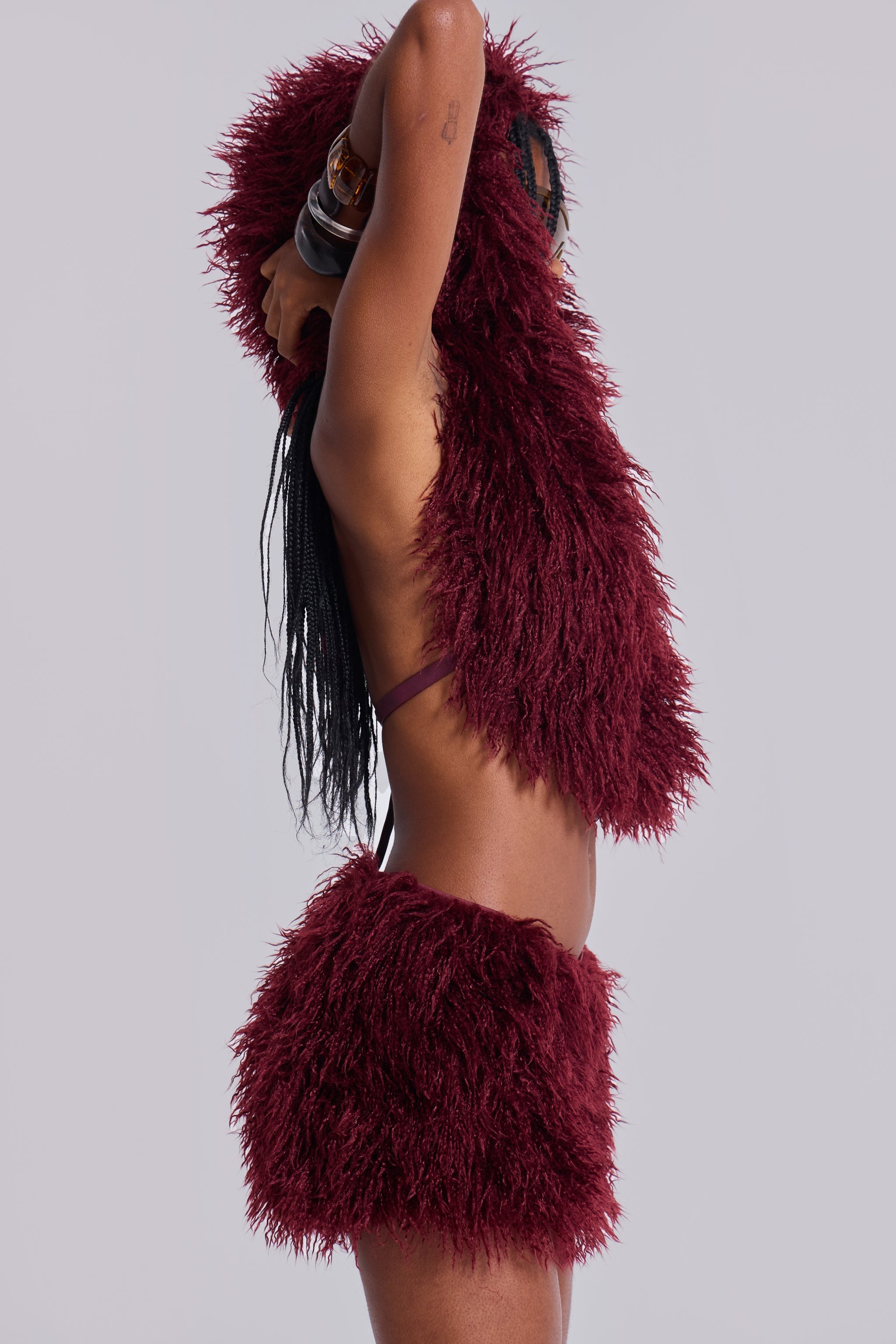 Haka Mongolian Faux Fur Backless Top in Wine