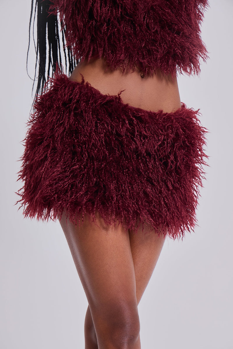 Haka Mongolian Faux Fur Mini Skirt in Wine