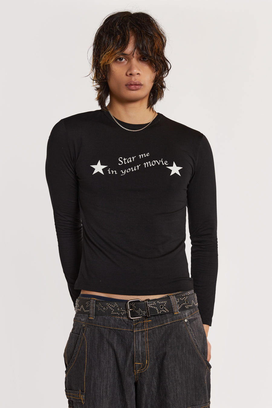 Male model wearing Black Long Sleeve Top With Movie Star Graphic. 