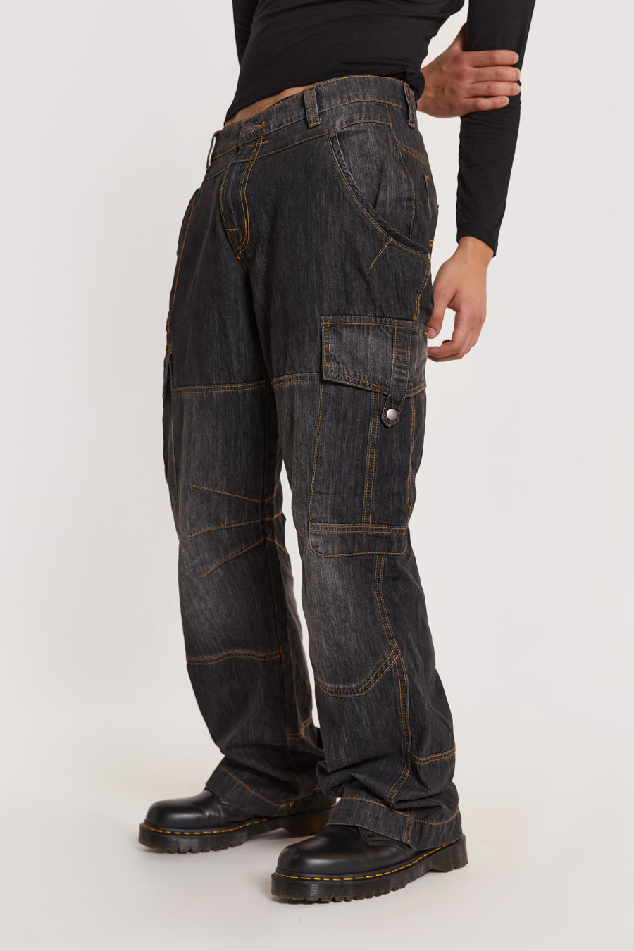 Male model wearing Black Chambray Denim Cargos. 