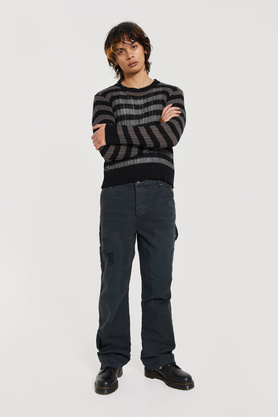 Male wearing Washed Black Carpenter Jeans With Inserted Panel. 