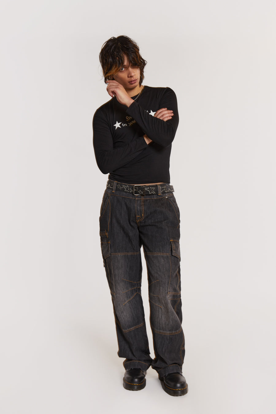 Male model wearing Black Chambray Denim Cargos. 