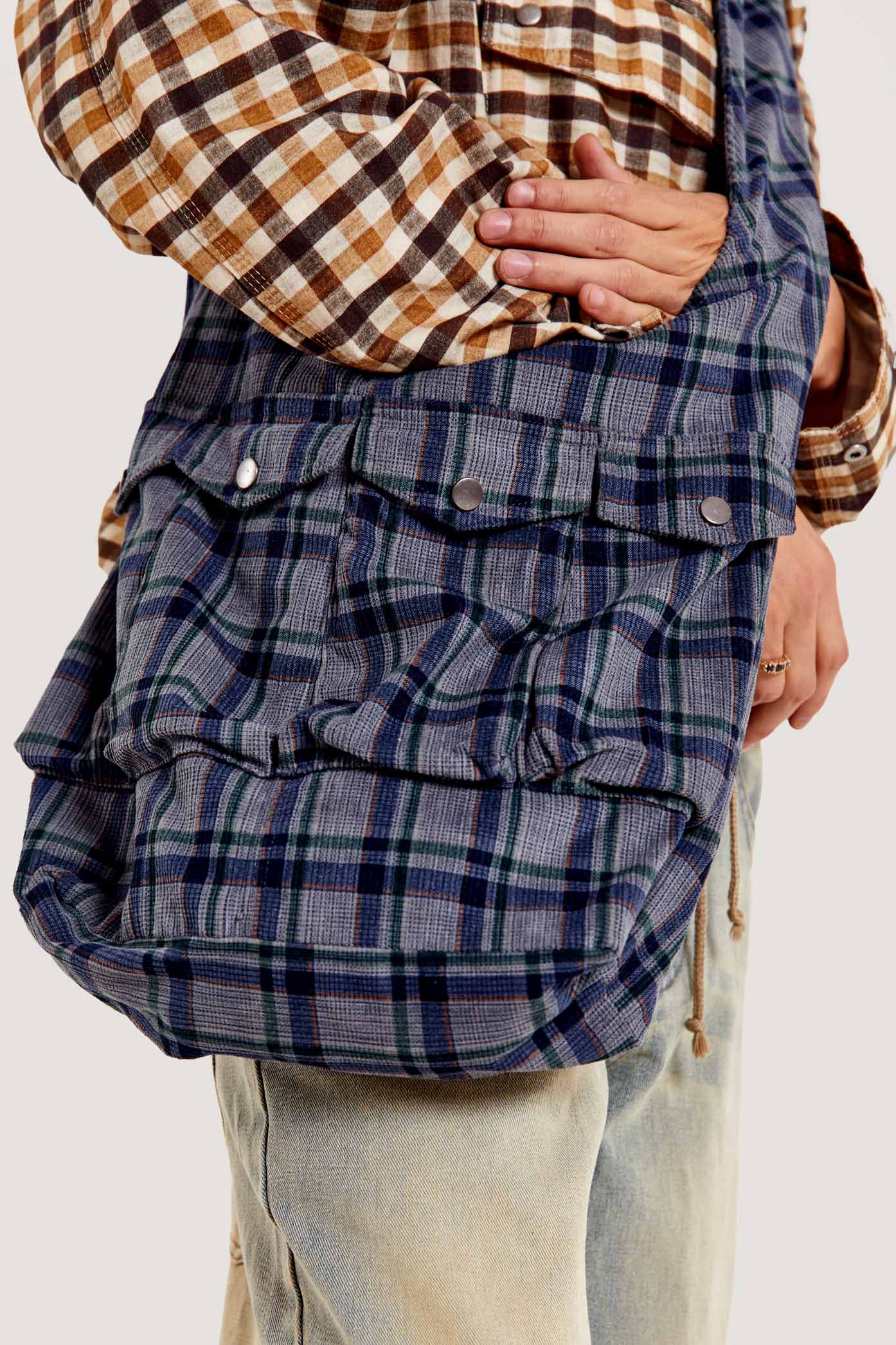 Blue printed check cord crossbody sling bag.