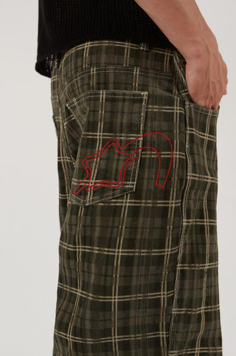 Male wearing Green Check Cord Short Jumbo Fit. 