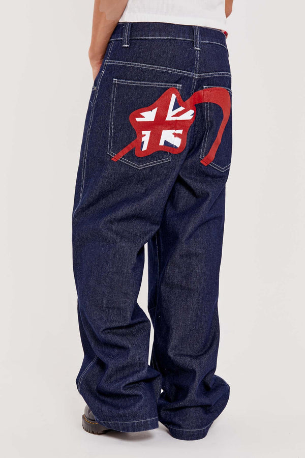 Male wearing indigo blue denim jeans in a jumbo fit with Union Jack star branding on back pocket. 