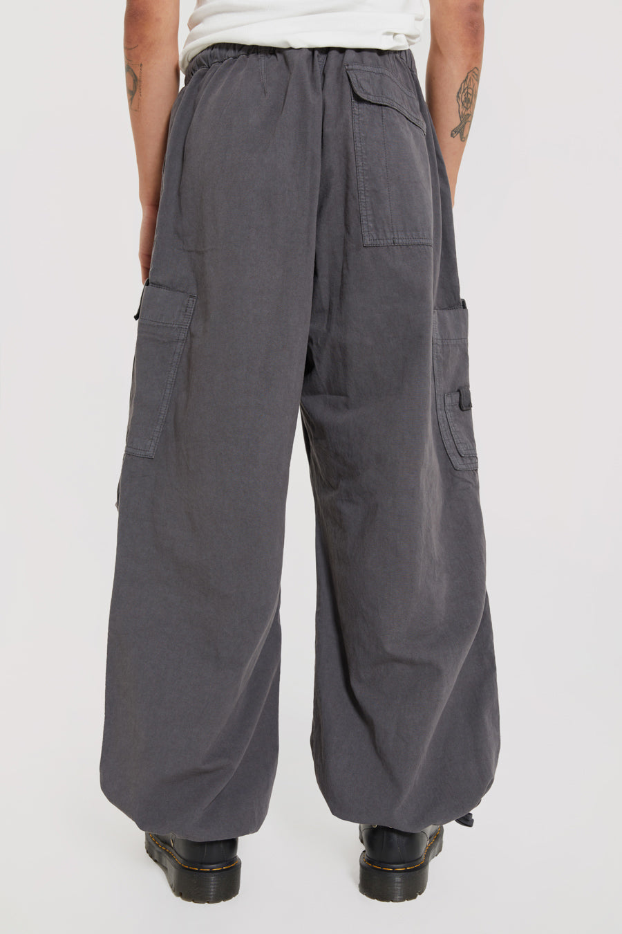 Vintage charcoal grey cargo military style pants with drawstring waistband in an oversized fit.