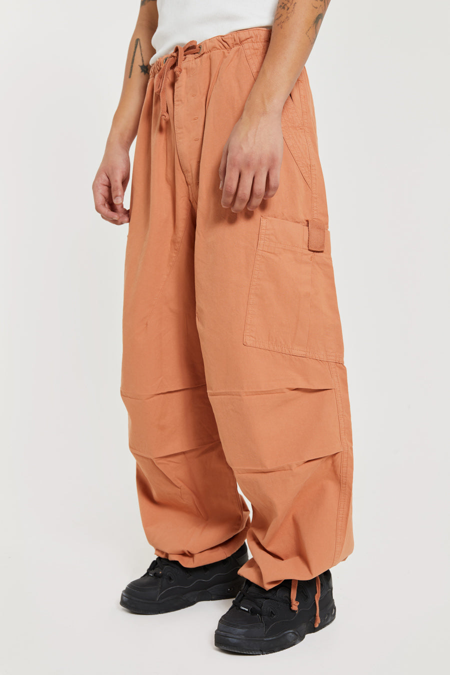 Terracotta Parachute Cargo Pants in an oversized fit