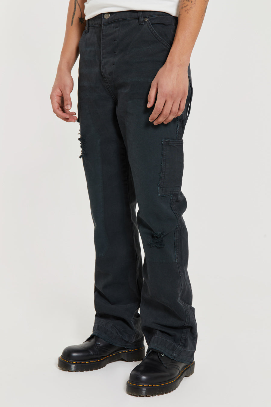 Male wearing Washed Black Carpenter Jeans With Inserted Panel. 