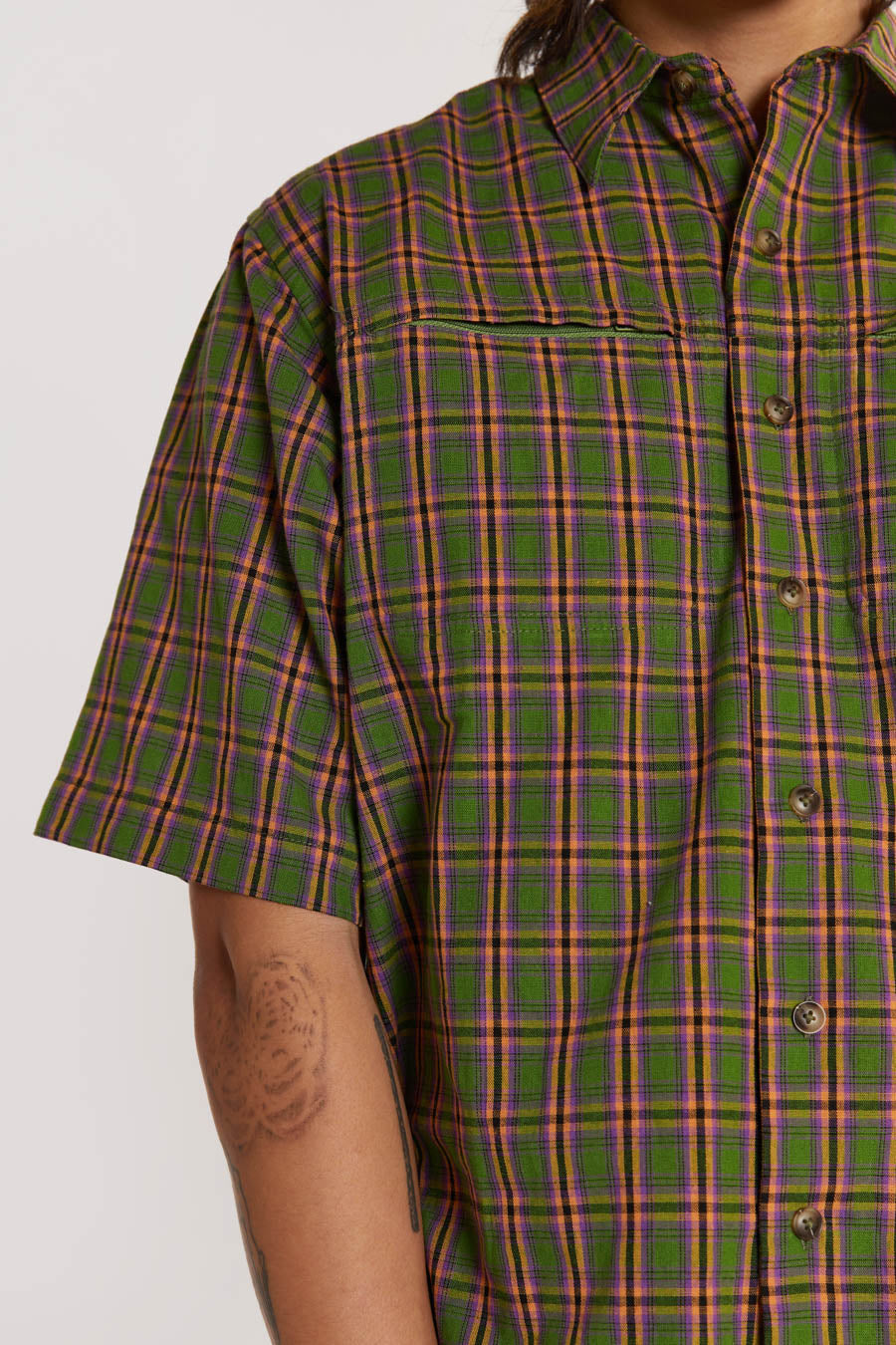 Male model wearing Green & pink Check Short Sleeve Shirt. 