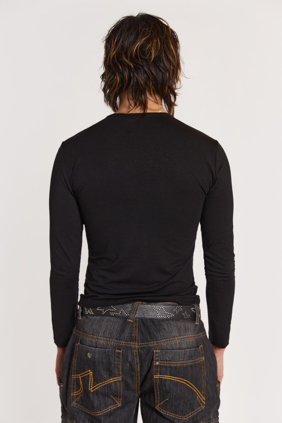 Male model wearing Black Long Sleeve Top With Movie Star Graphic. 