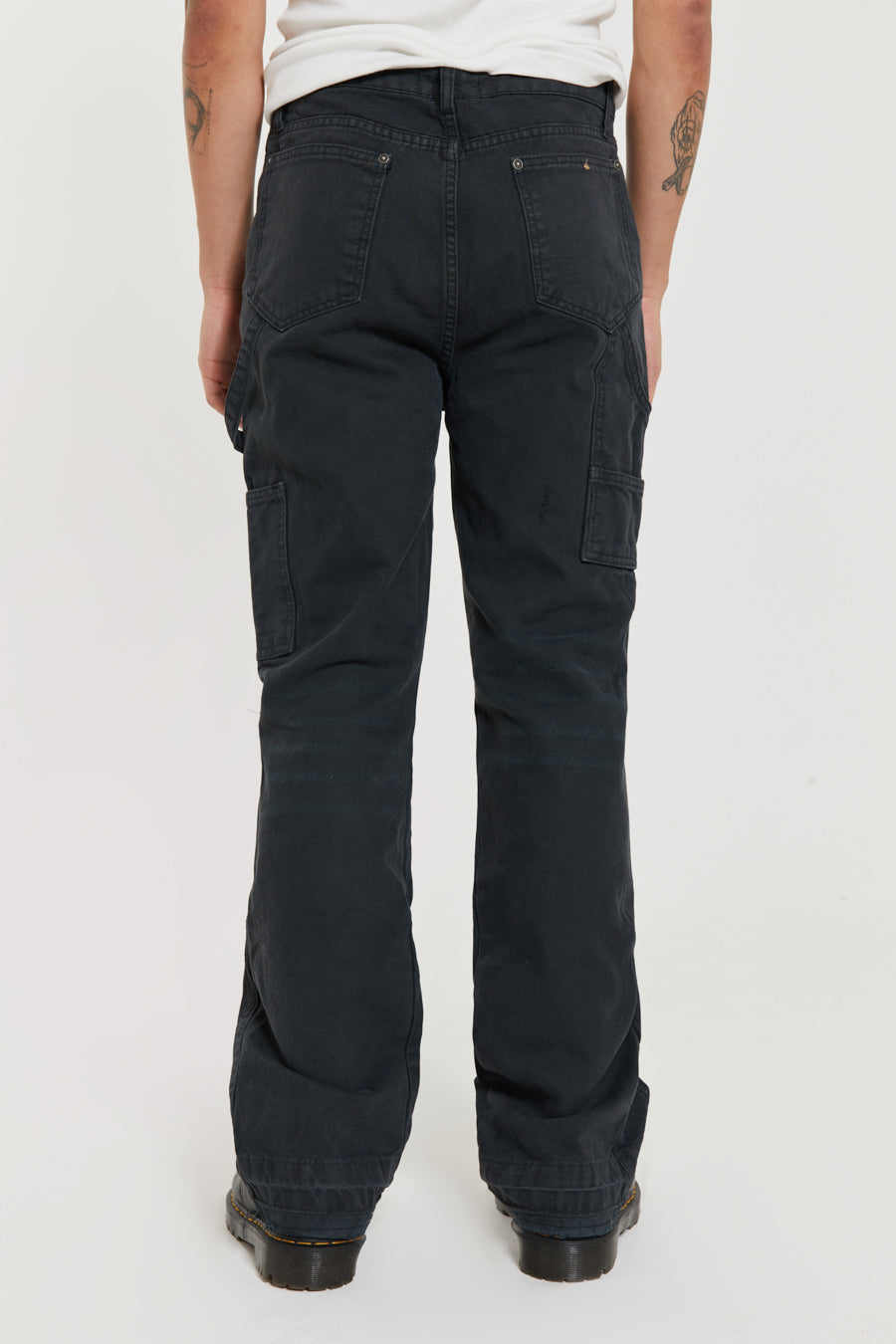 Male wearing Washed Black Carpenter Jeans With Inserted Panel. 