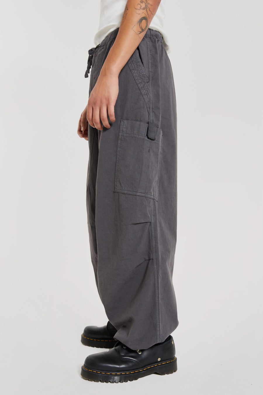 Vintage charcoal grey cargo military style pants with drawstring waistband in an oversized fit.