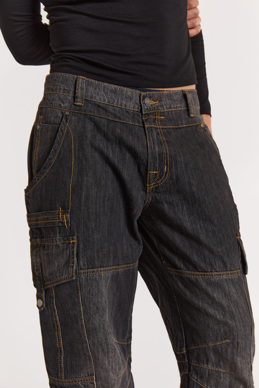 Male model wearing Black Chambray Denim Cargos. 