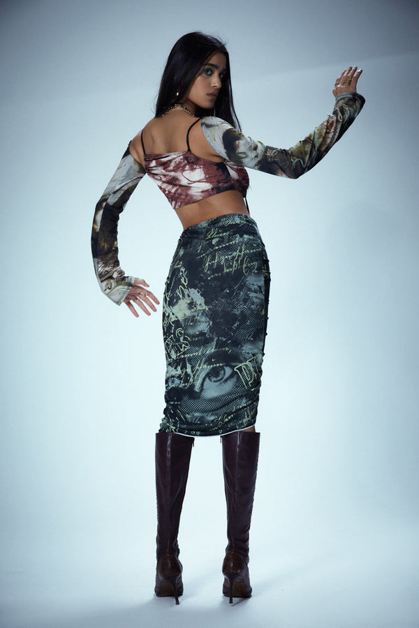 Mixed print long sleeve midi dress stress in a bodycon fit with ruched skirt detail.