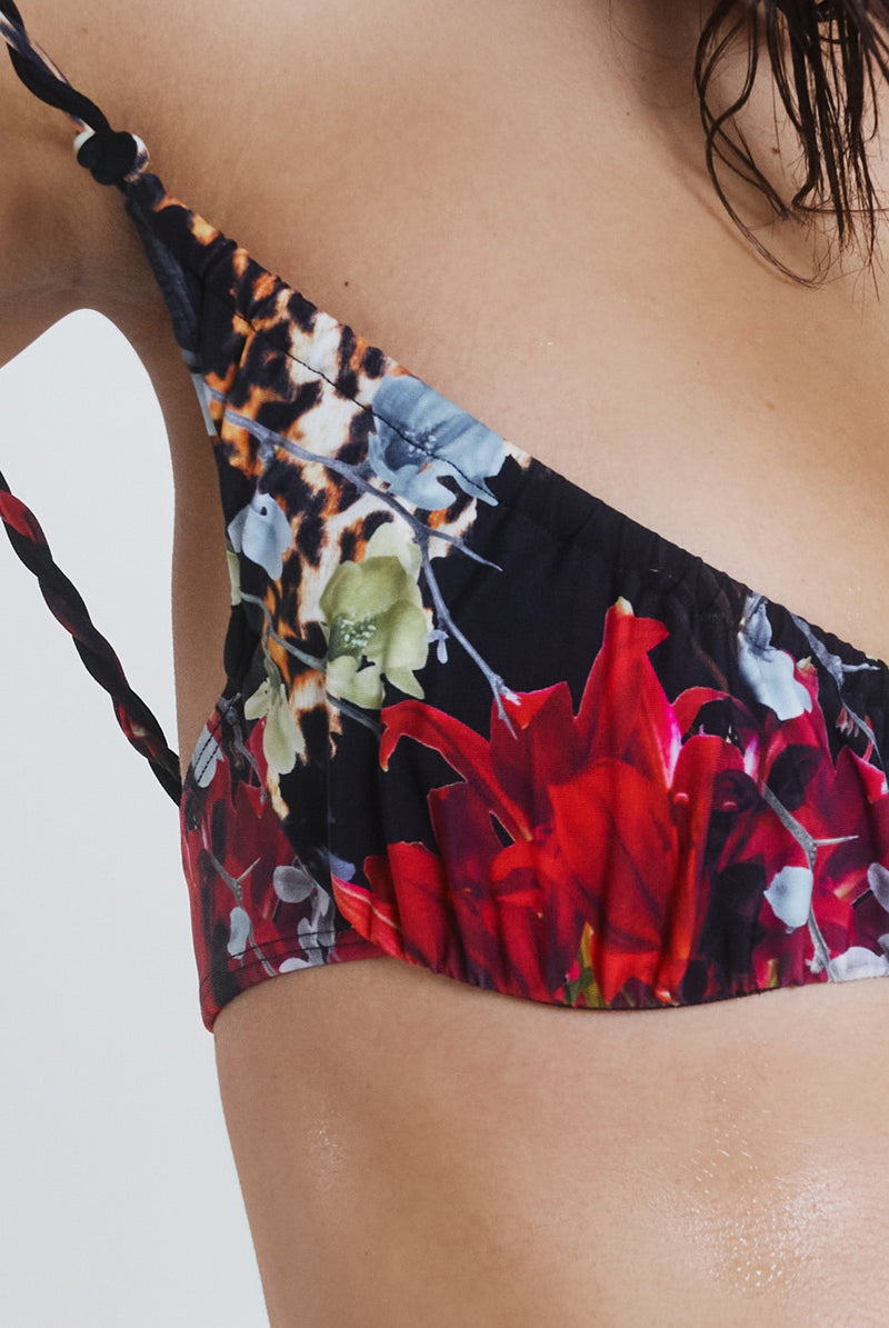 Female model wearing Dark Romantic Leopard Print Crop Ruched Cup Bikini Top. Styled with the matching micro bikini bottoms. 