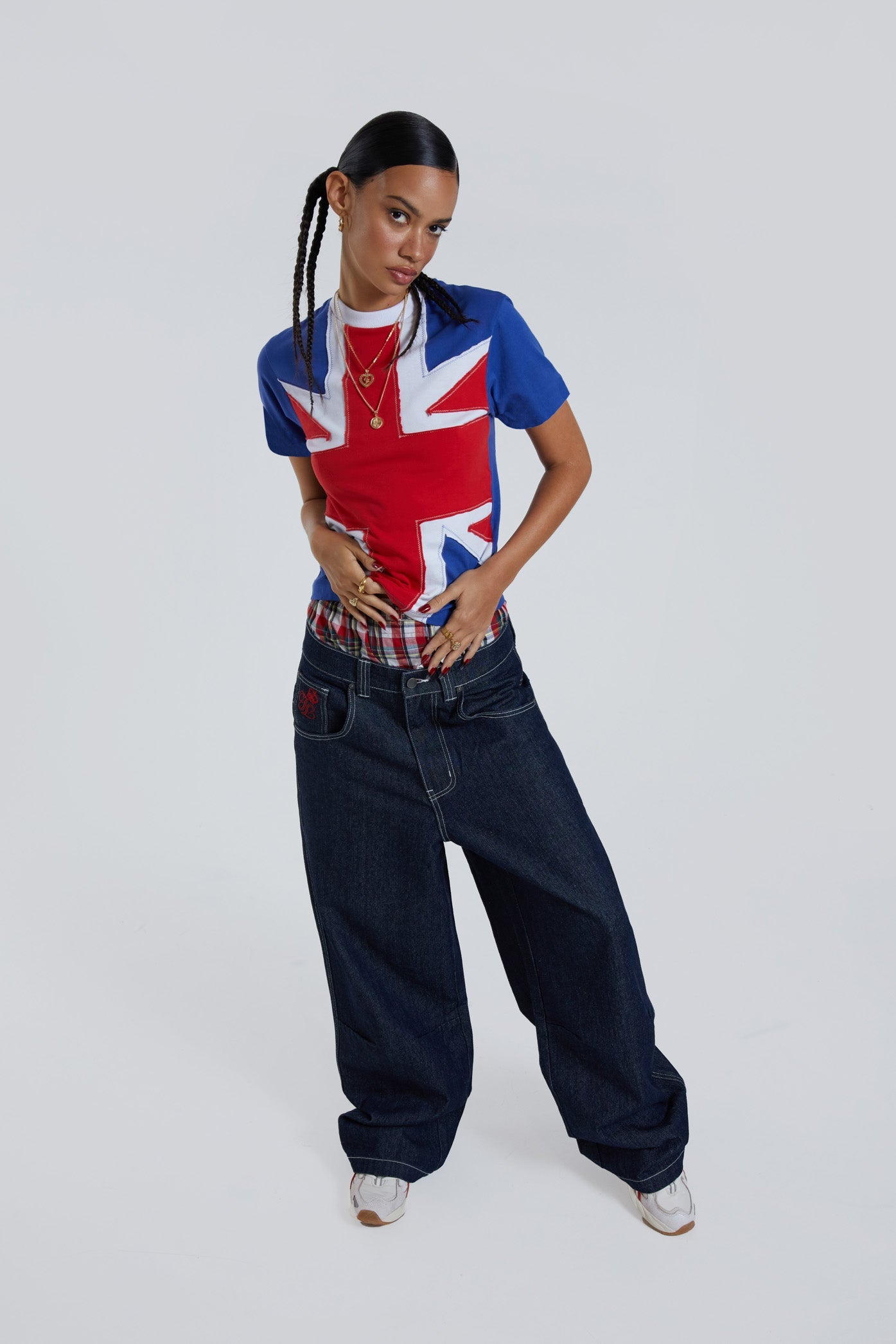 Female wearing Union Jack printed slim fit crew neck short sleeve t-shirt. 