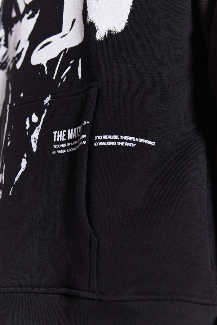 close up detail of oversized printed black hoodie