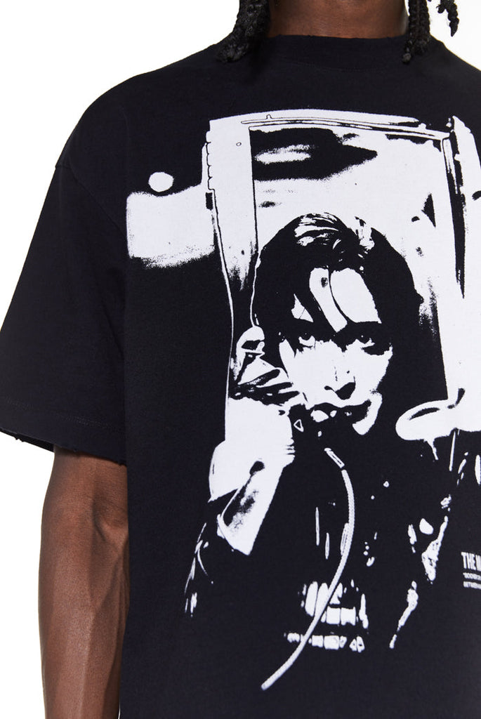 close up detail of oversized printed black tshirt