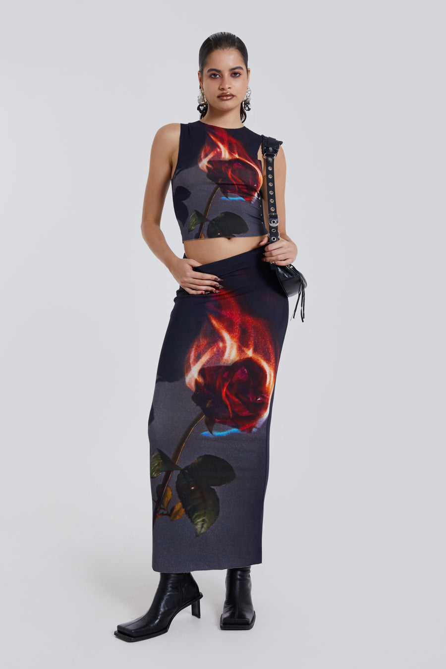 Female model wearing Flaming Rose Raw Edge Tank Top. Styled with the matching maxi length skirt. 