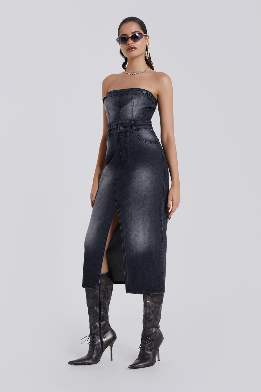 Female model wearing a Black Bandeau Denim Corset Midi Dress. 