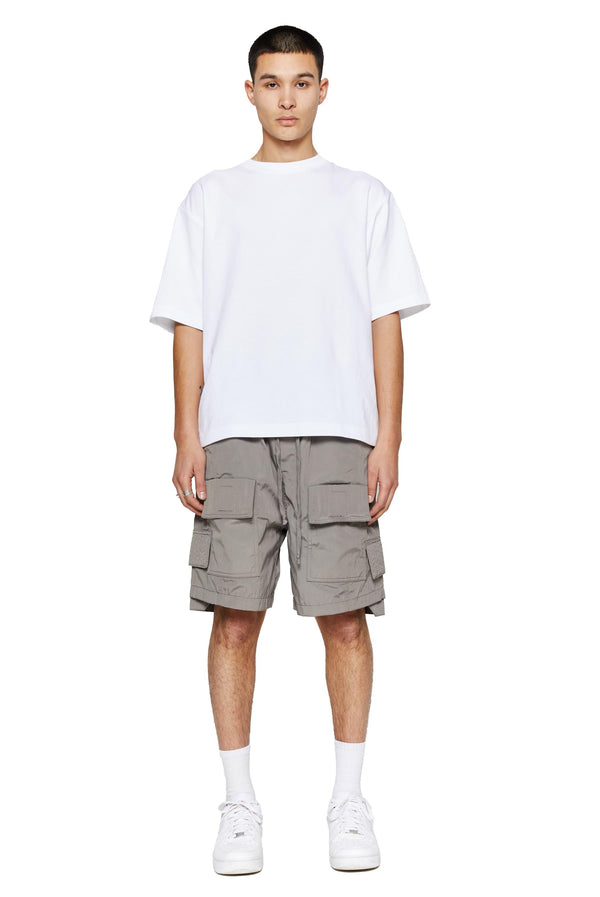 Grey oversized cargo shorts in relaxed fit with ten pocket styling detail. 