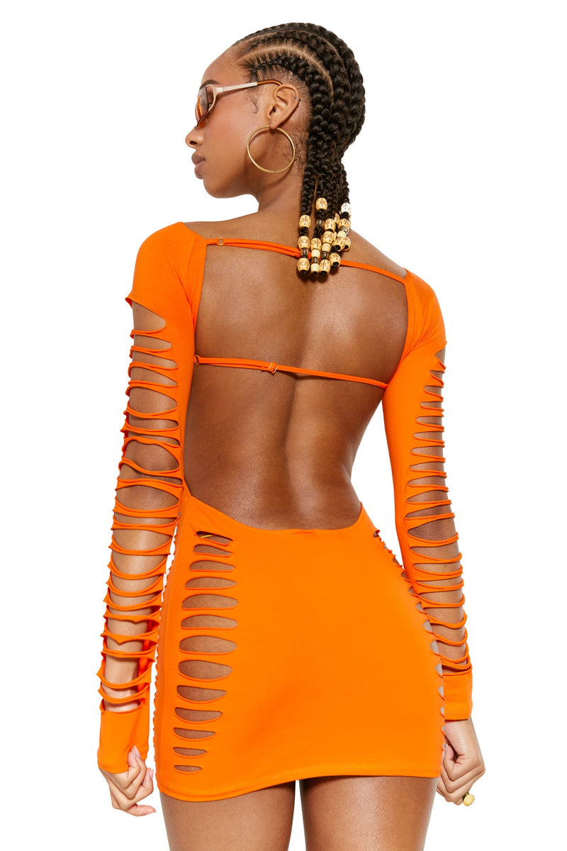 Female model wearing orange Butterfly Slashed Cut Out Backless long sleeve bodycon mini dress.