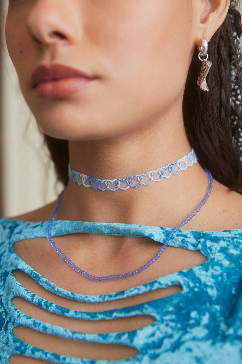 Female wearing Blue Bohemian Necklace 