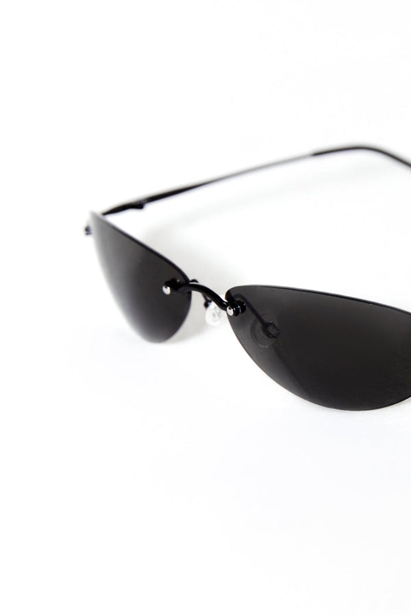 close up of Black lense slim line sunglasses