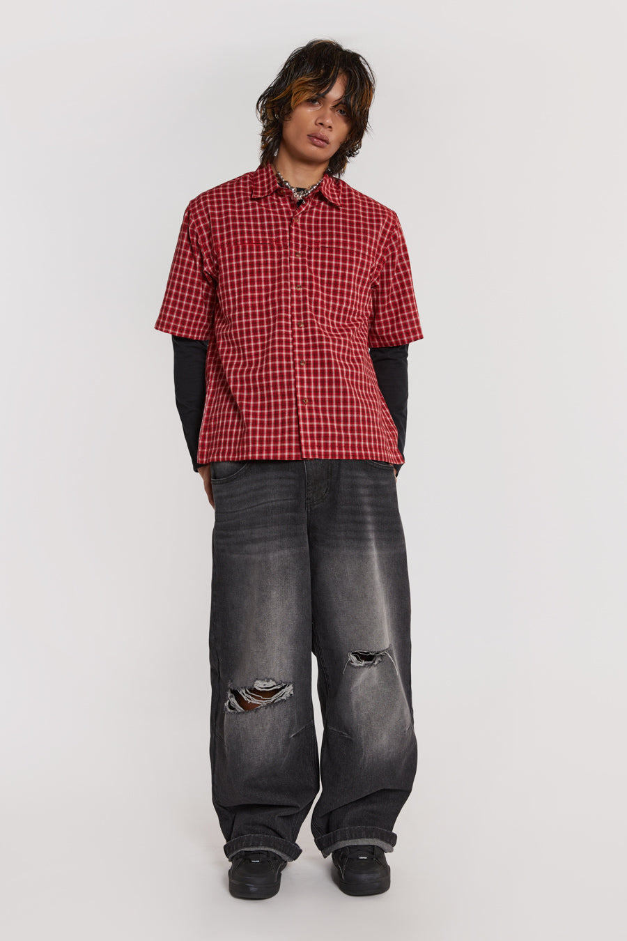 Male model wearing Red Check Short Sleeve Shirt. 