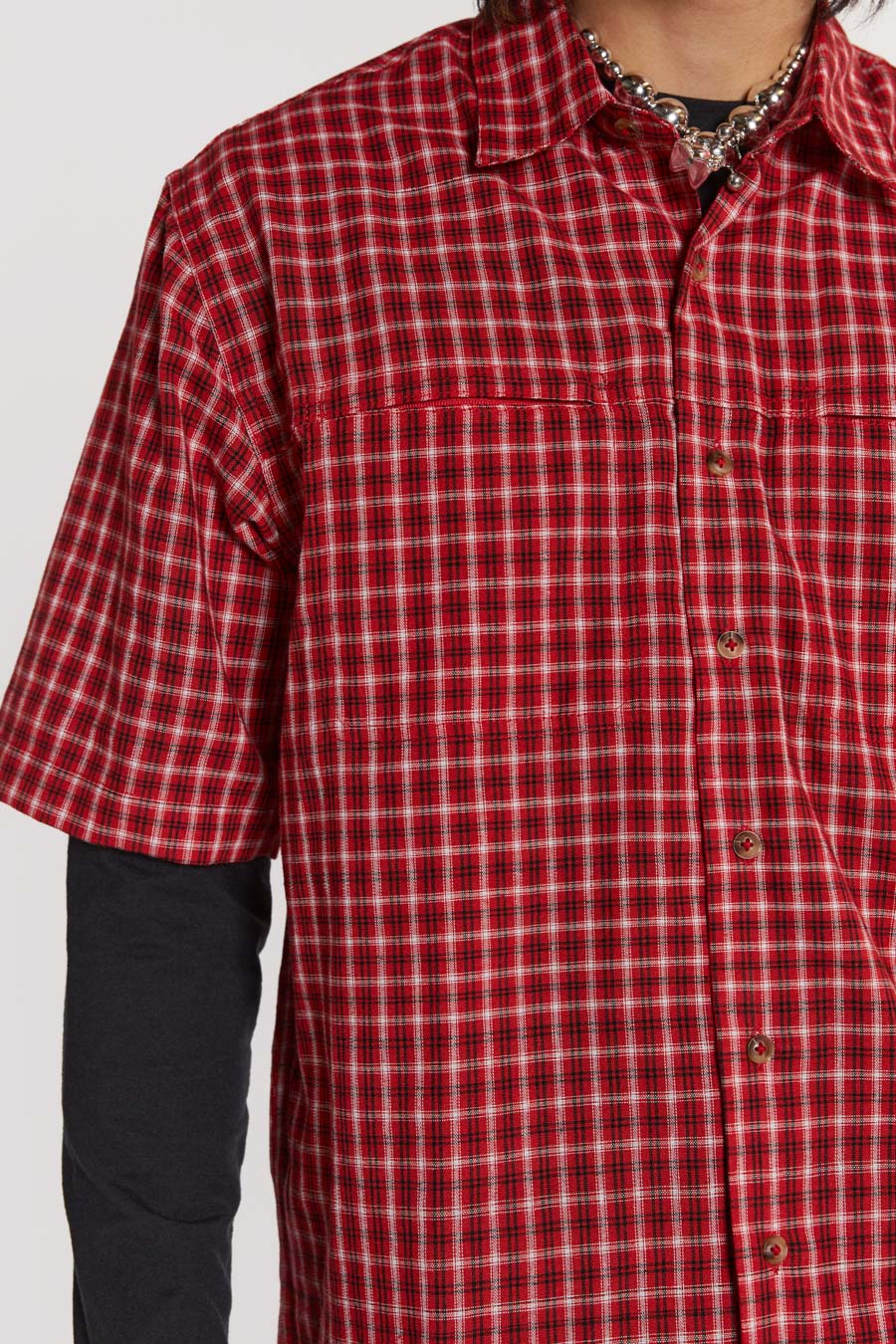 Male model wearing Red Check Short Sleeve Shirt. 