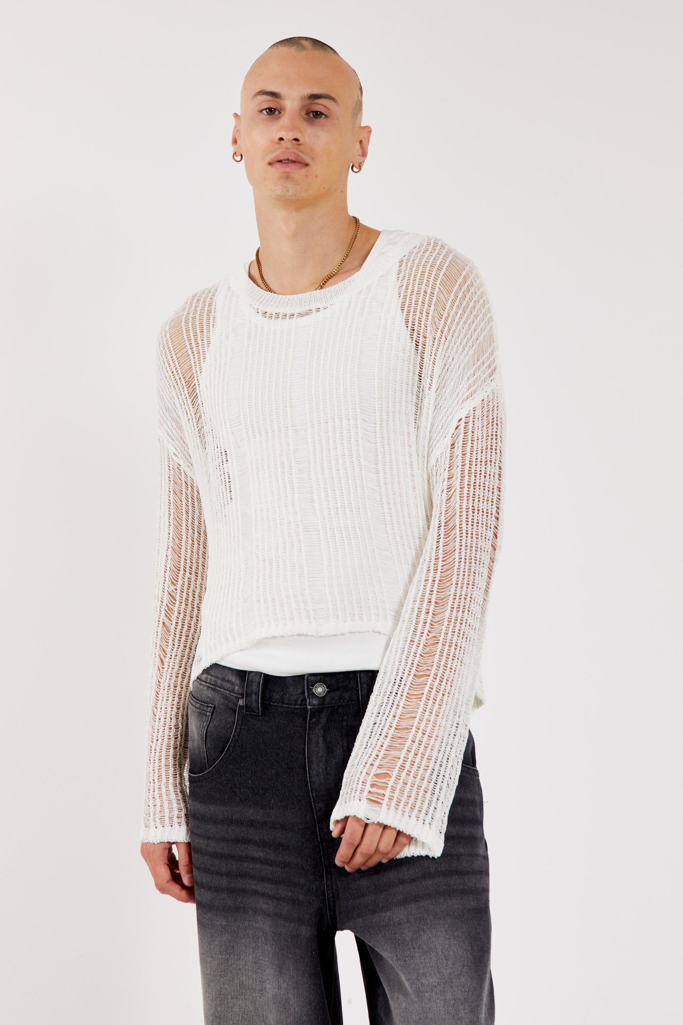 Male wearing White Loose Knit Long Sleeve Jumper.  