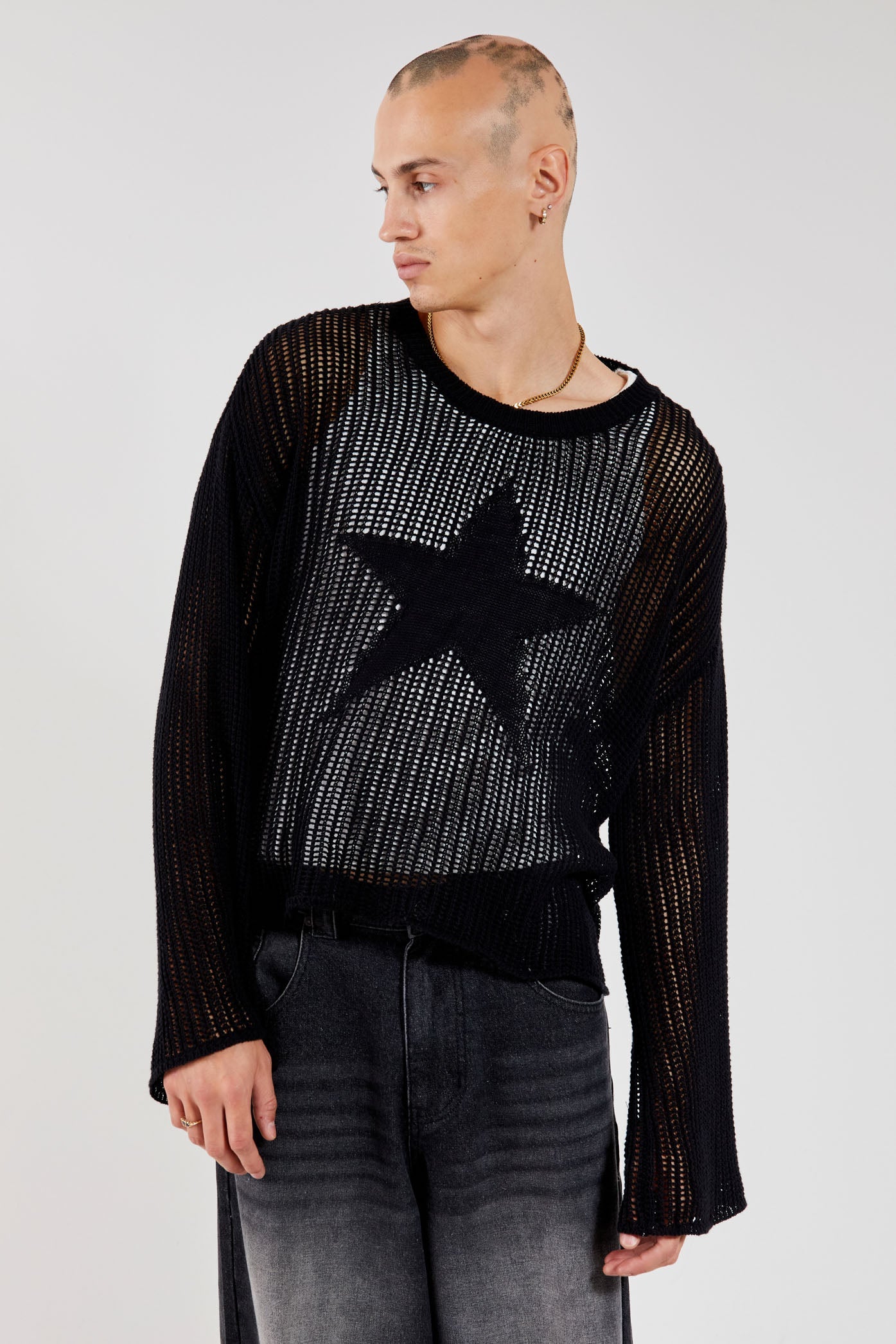 Male wearing Black Star Loose Knit Jumper.