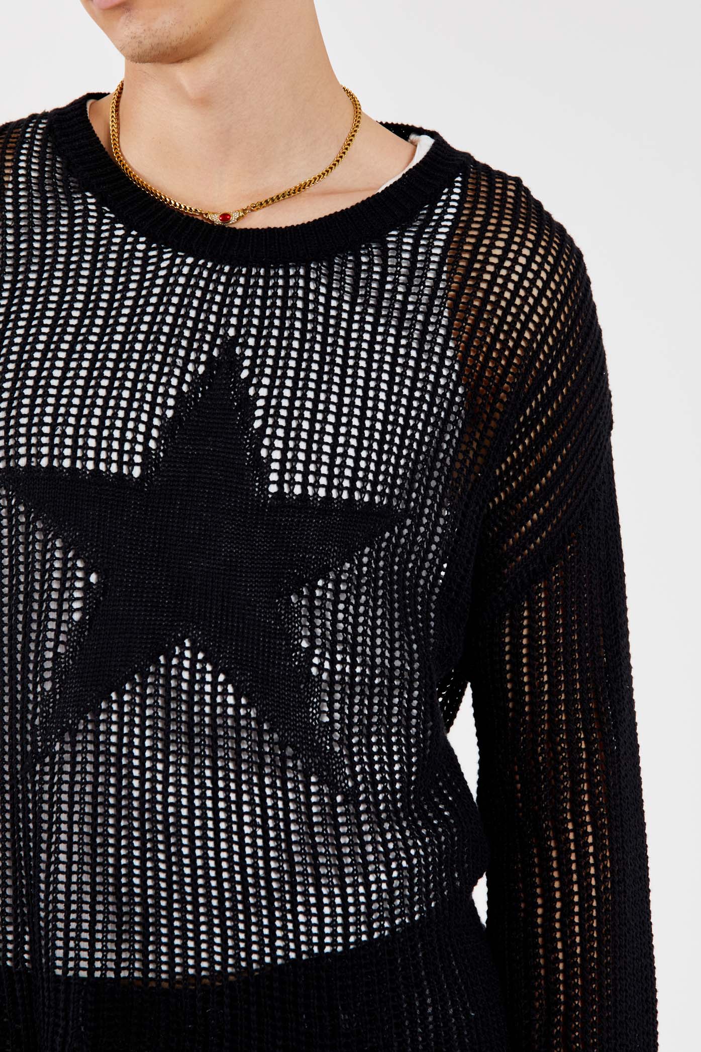 Male wearing Black Star Loose Knit Jumper.