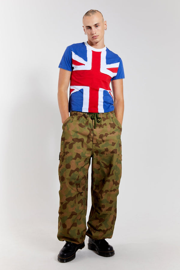 Men's camo printed military inspired parachute cargo pants.