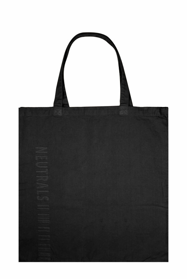 Dust black extreme oversized tote bag with embroidered branding detail. 