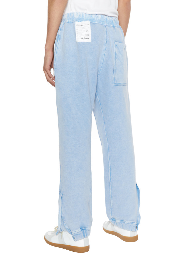 Powder blue cuffed joggers with drawstring waistband. 