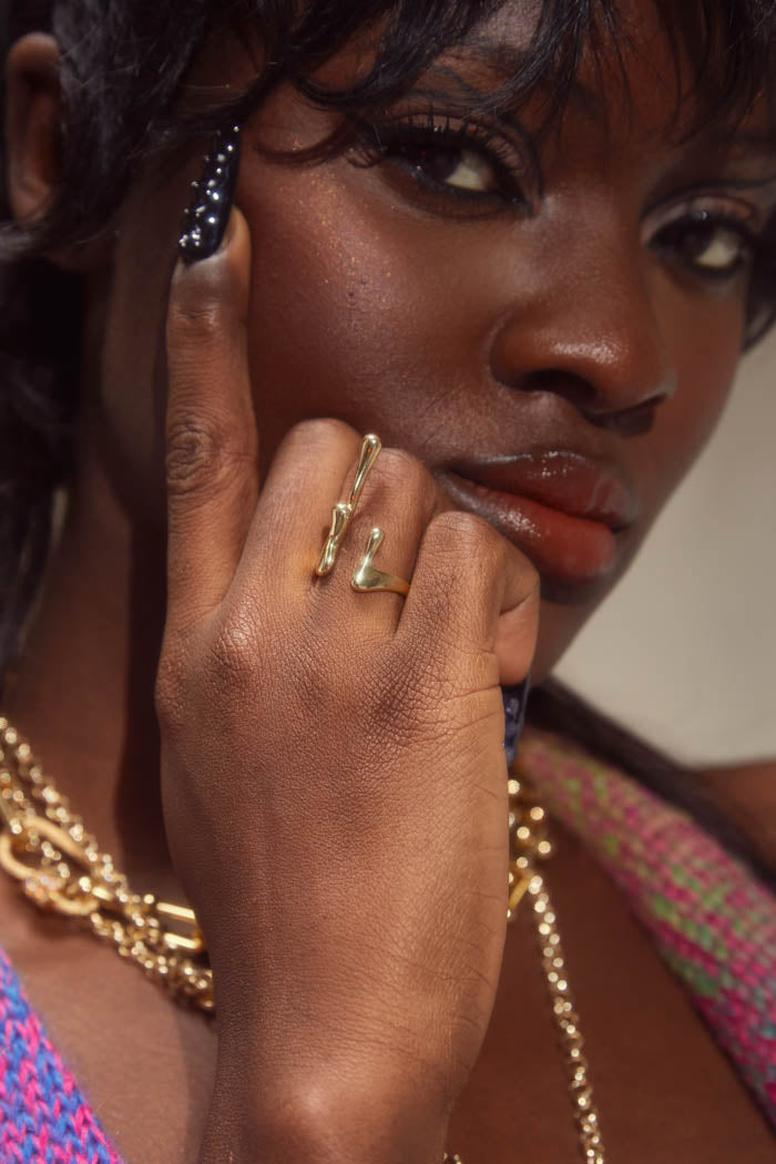 Gold metal droplet drip style ring. 