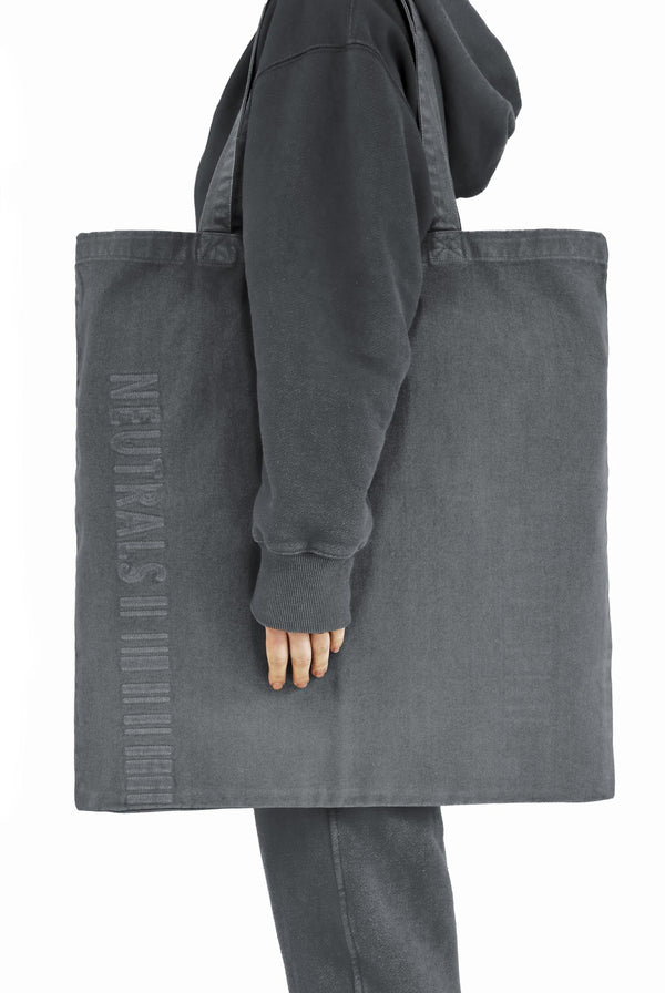 Chrome grey extreme oversized tote bag with embroidered branding detail. 