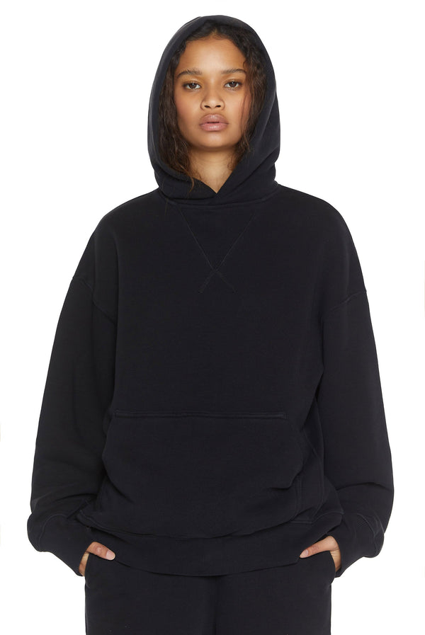 Dust black oversized hoodie, styled with the matching joggers. 