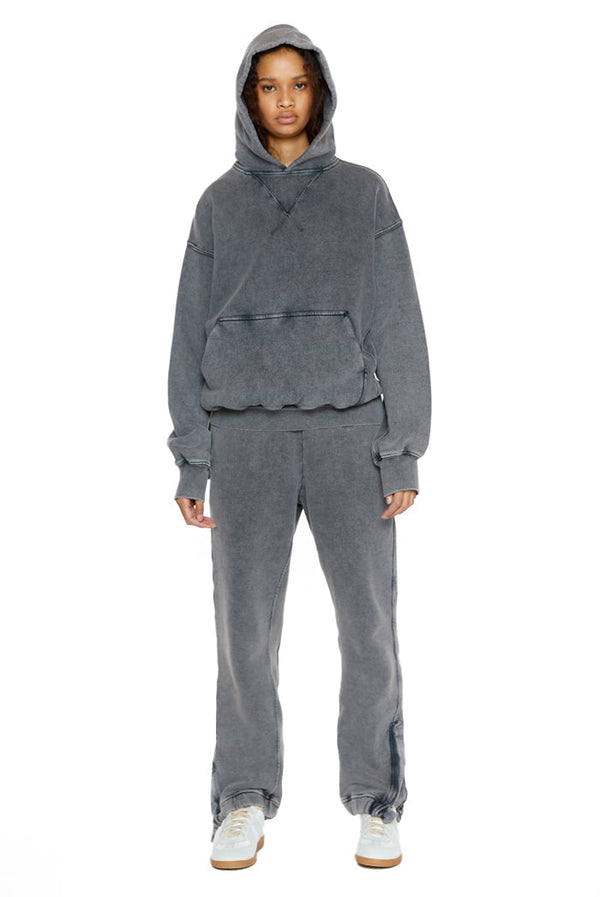 Chrome grey oversized hoodie, styled with the matching joggers. 