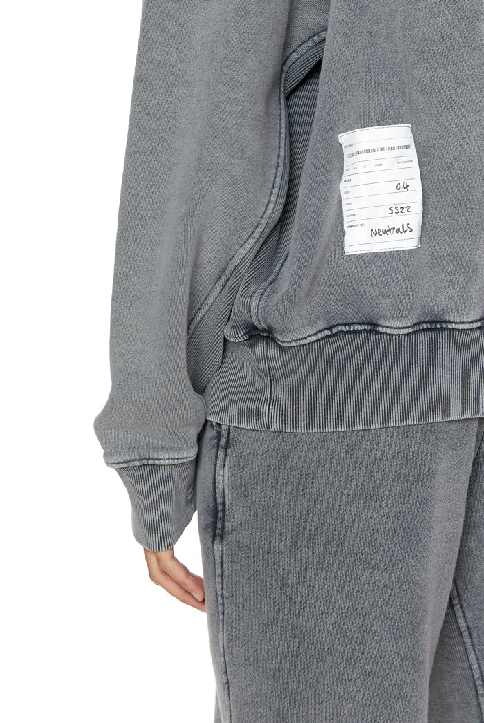 Chrome grey crew neck oversized sweatshirt with ribbed detailing. Styled with matching joggers. 