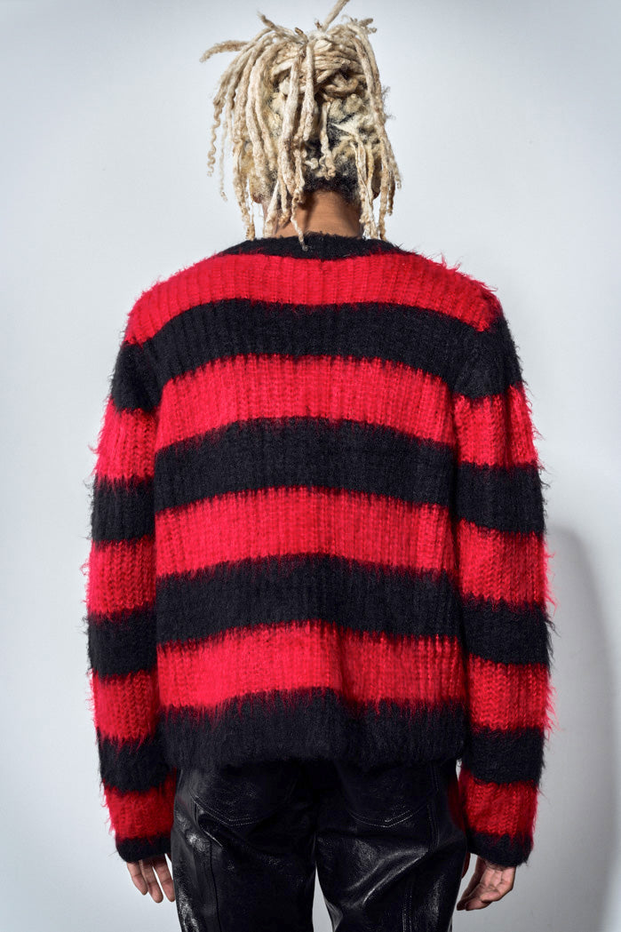 Back view of oversized large stripe black and red knit jumper