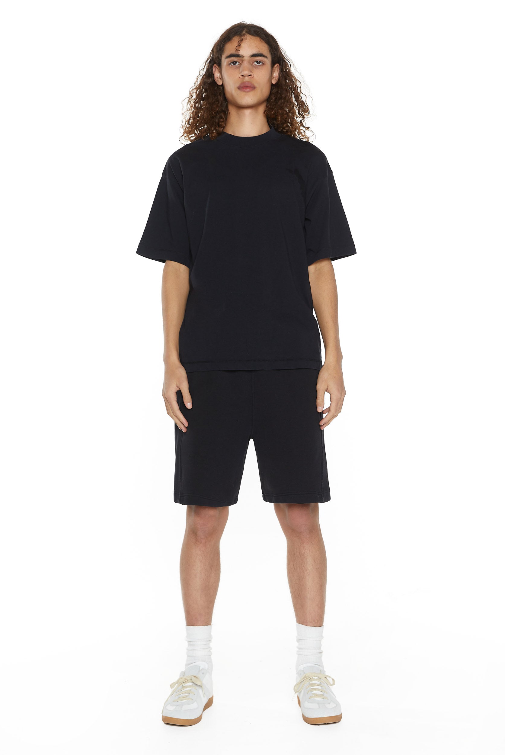 Dust black oversized crew neck t-shirt. Styled with the matching shorts. 