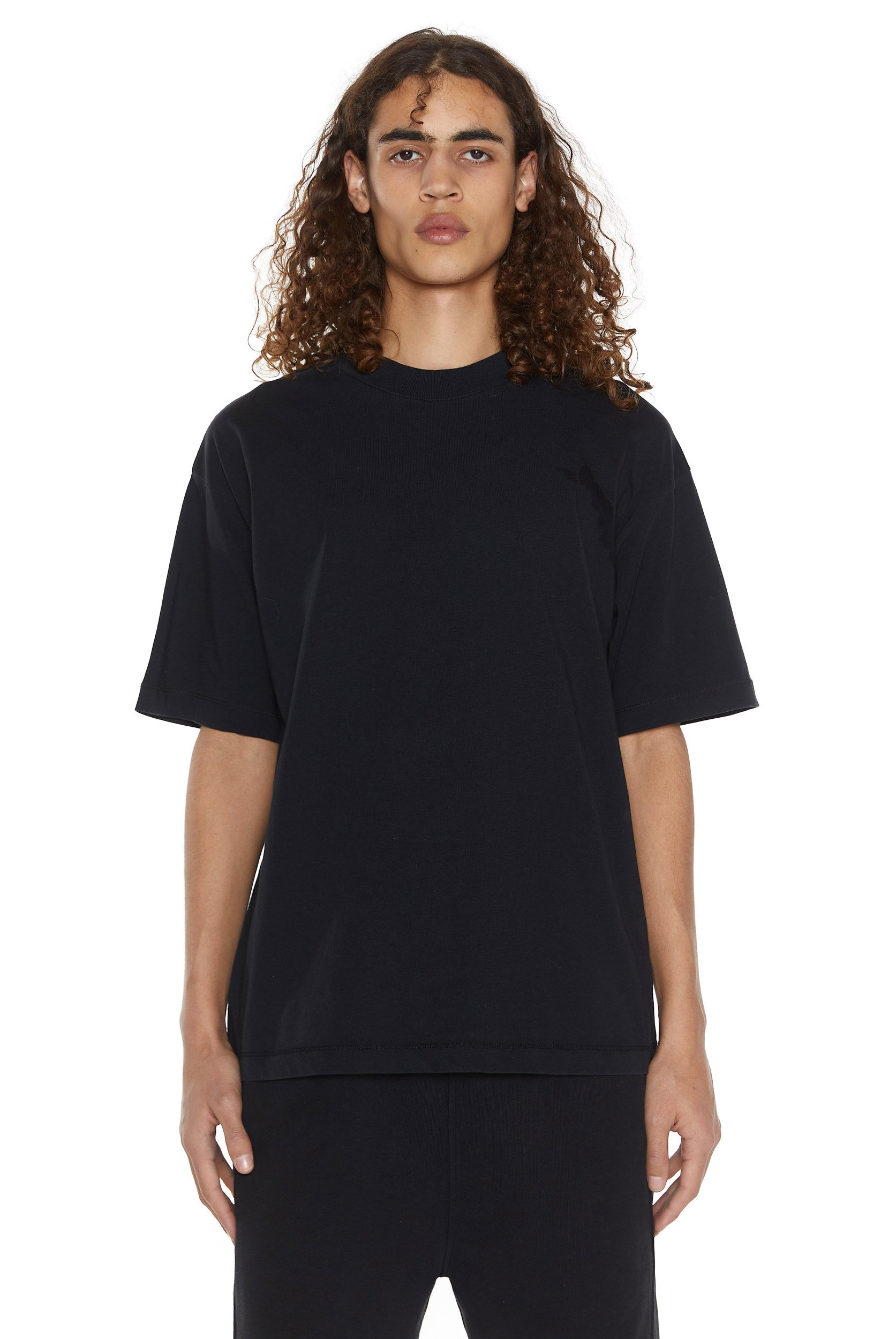 Dust black oversized crew neck t-shirt. Styled with the matching shorts. 