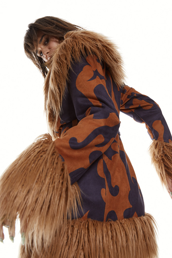Western printed afghan style coat with belt and brown faux fur detail.