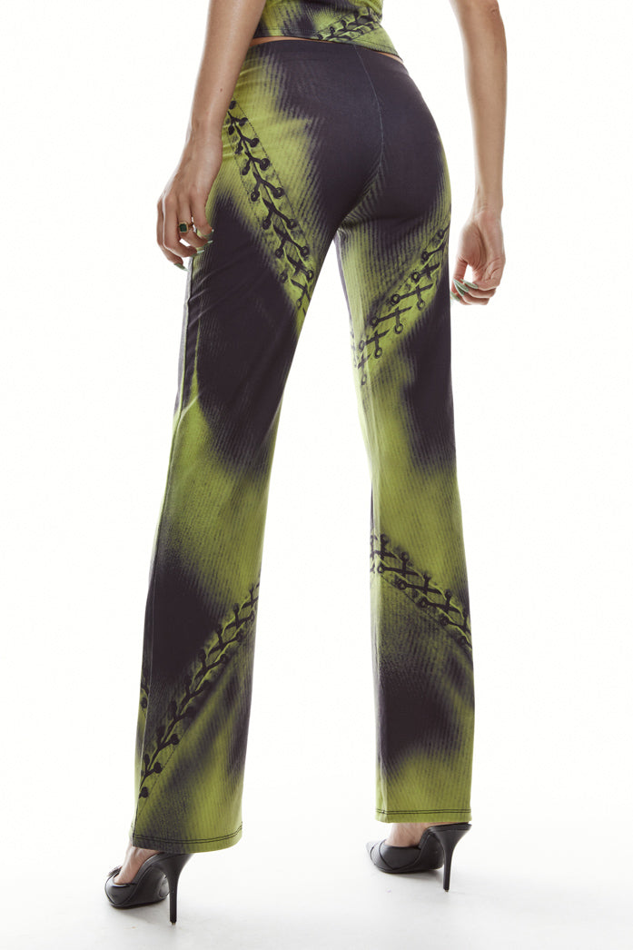 Green safety pin print jersey trousers.