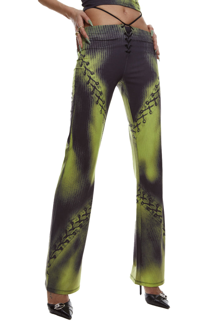 Green safety pin print jersey trousers.