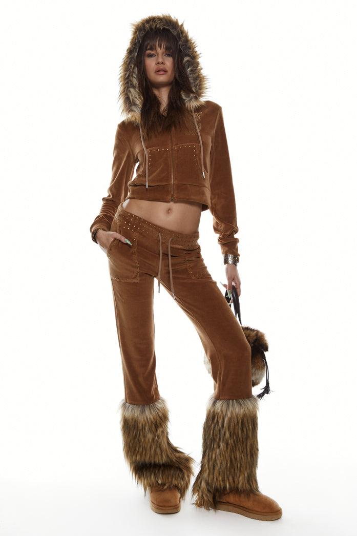 Brown studded drawstring waistband joggers with faux fur hem detail. Styled with the matching hoodie.