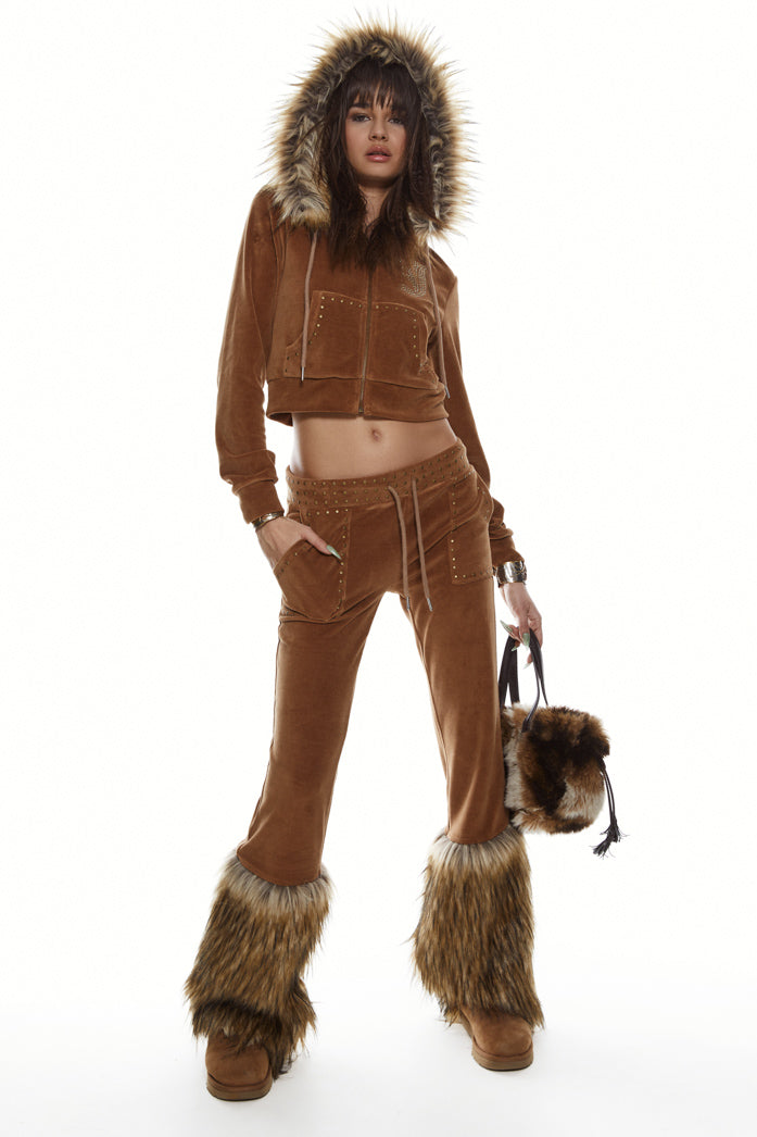 Brown studded drawstring waistband joggers with faux fur hem detail. Styled with the matching hoodie.