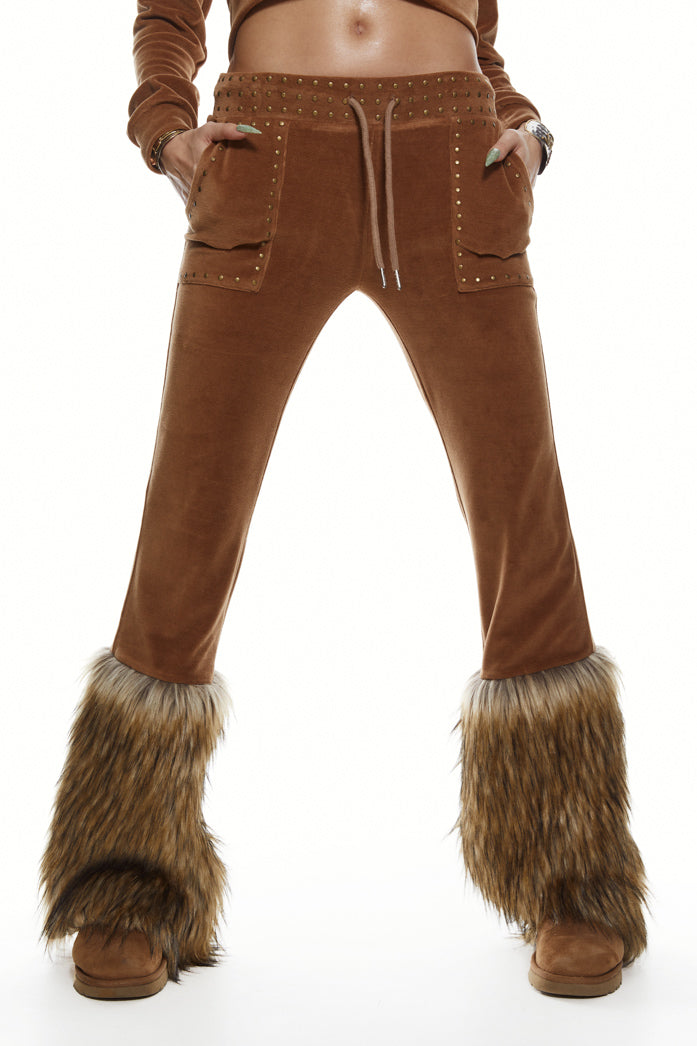 Brown studded drawstring waistband joggers with faux fur hem detail. Styled with the matching hoodie.